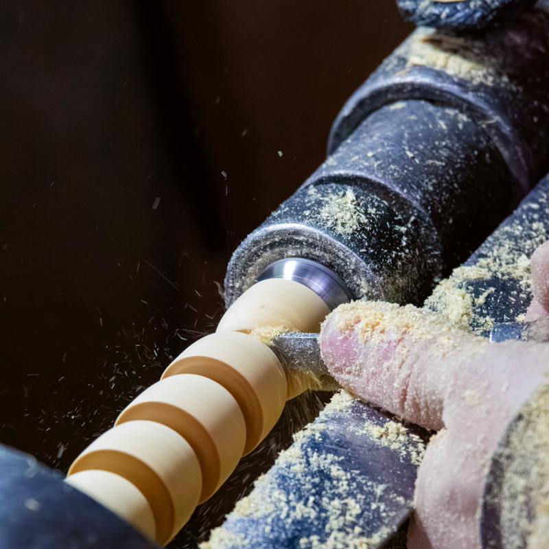 Woodturning process in an artisan workshop