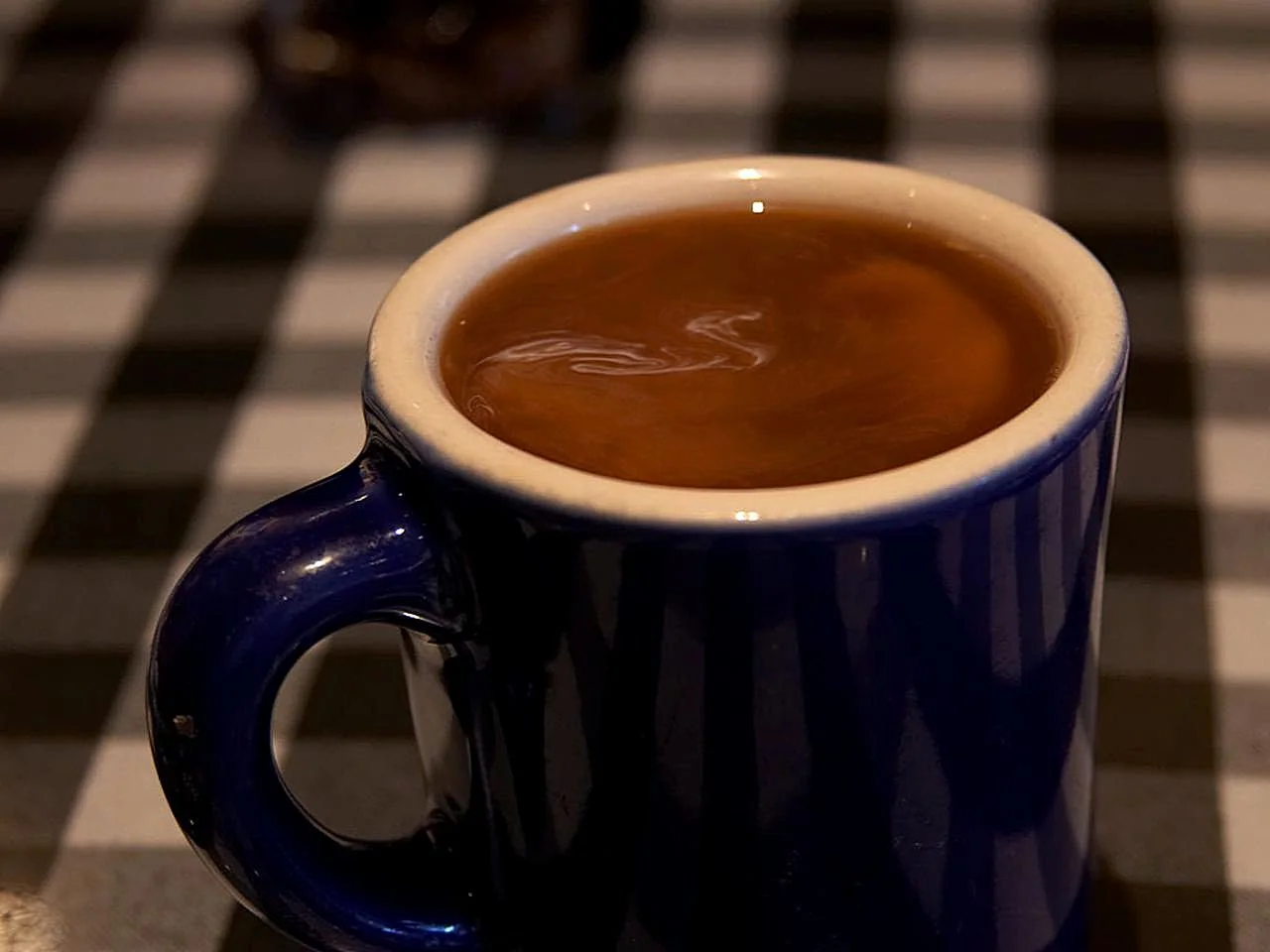 Black coffee in a blue mug