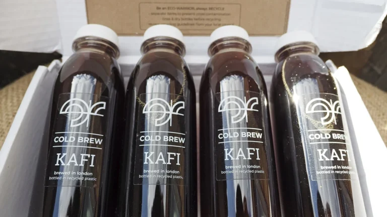 Bottles labeled cold brew coffee arranged in their delivery box