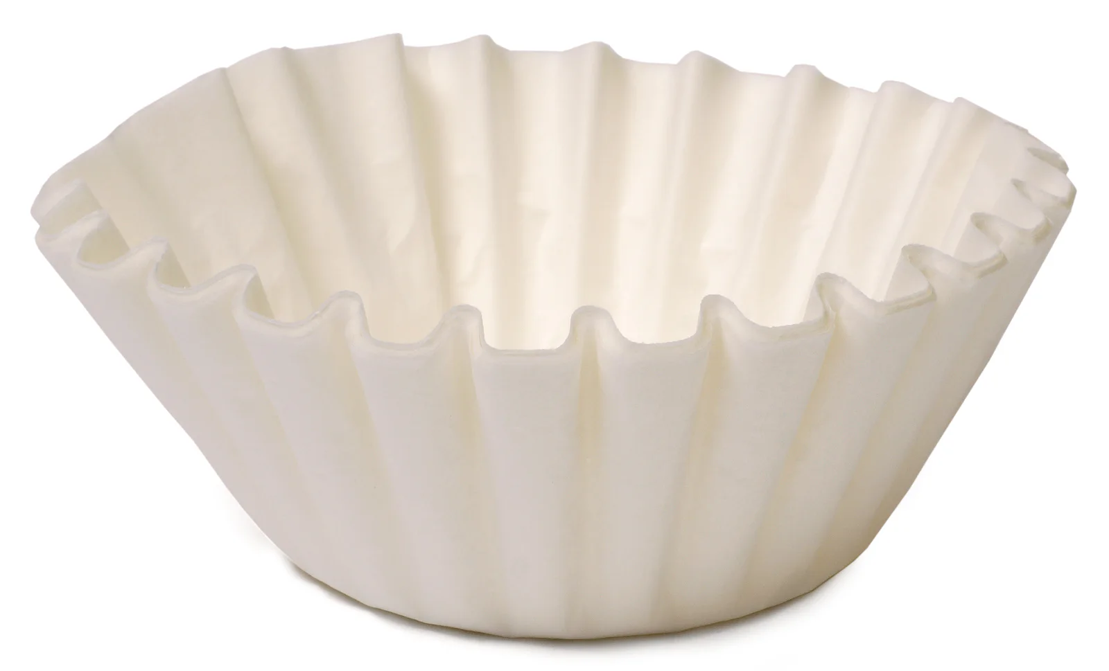 A small stack of white basket-shaped paper coffee filters